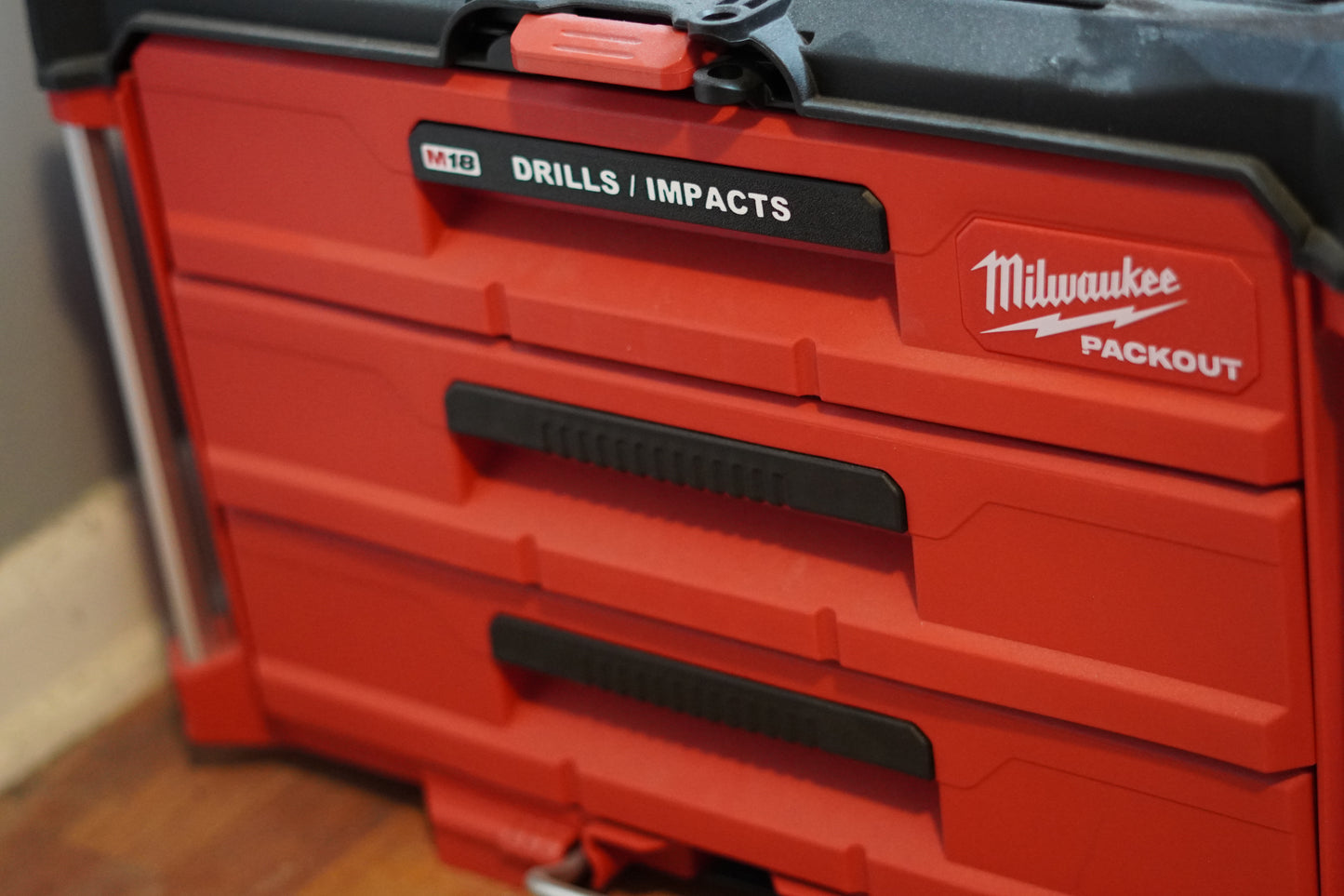 Custom “DRILLS / IMPACTS” handle label installed on a Milwaukee 3-drawer toolbox