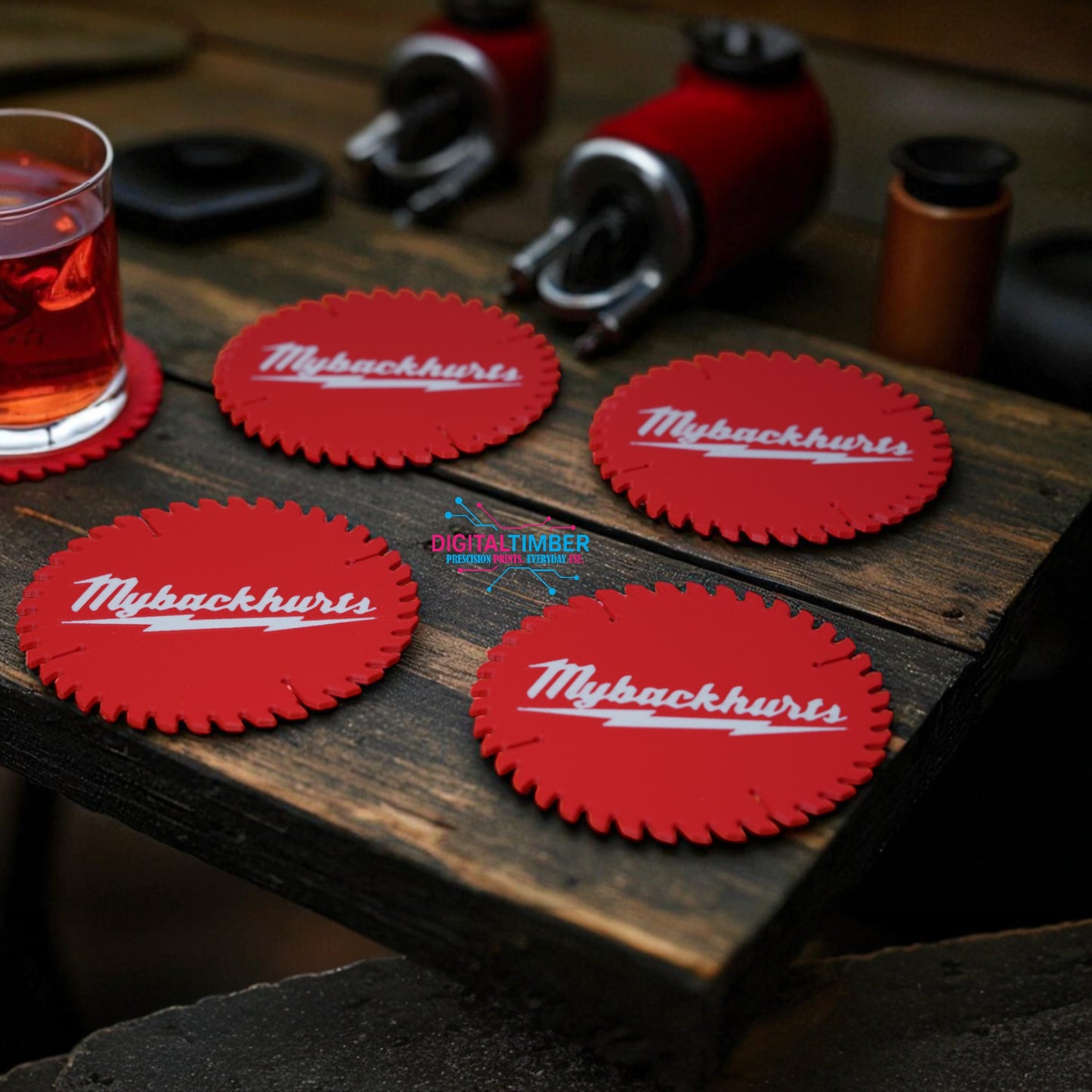 Red coasters with 'Mybackhurts' logo on a wooden surface.