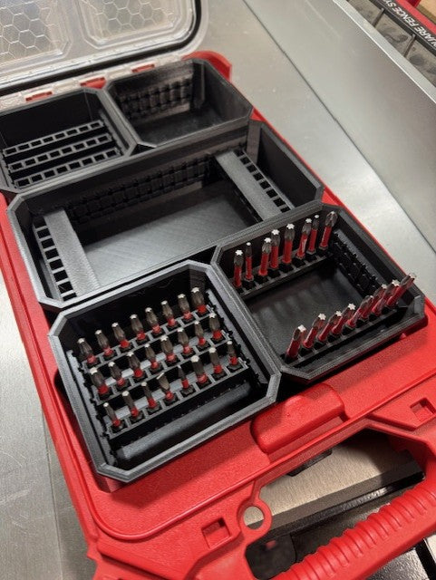 Organized drill bits in Milwaukee short bit holders.